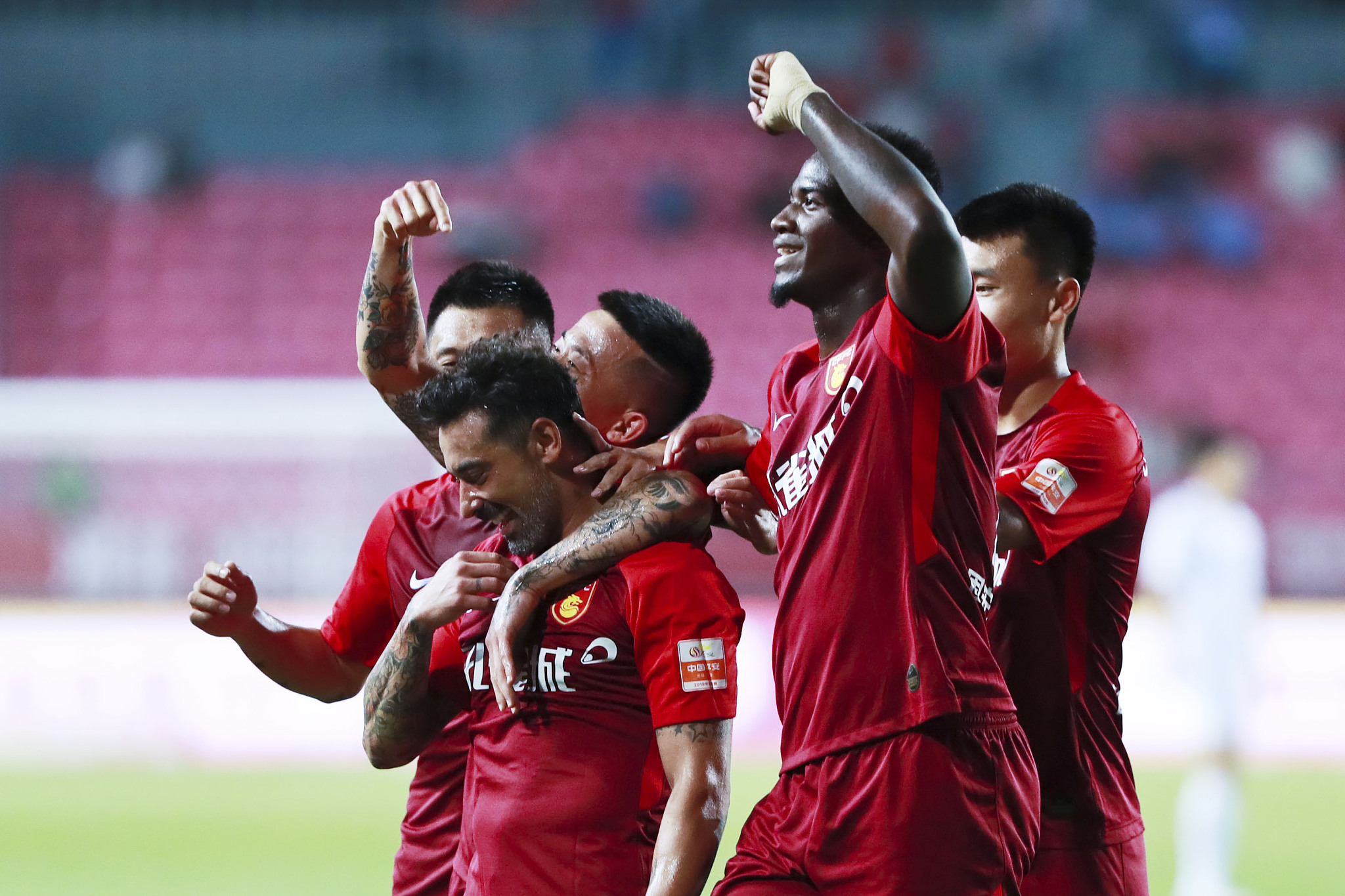 认为他的成 认为他的成